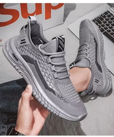 Baskets de sport à lacets et semelles épaisses, aérées et en maille